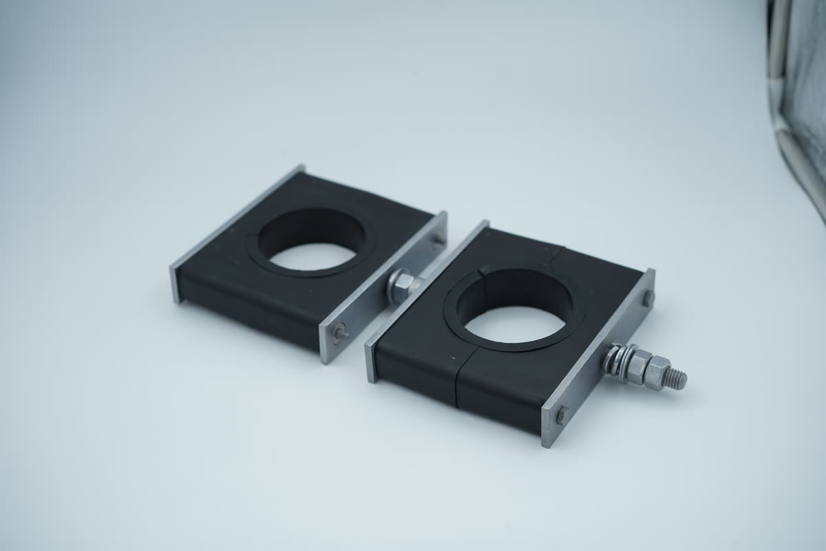 Orientable swivel wind turbine clamp angled view showing insert cavity